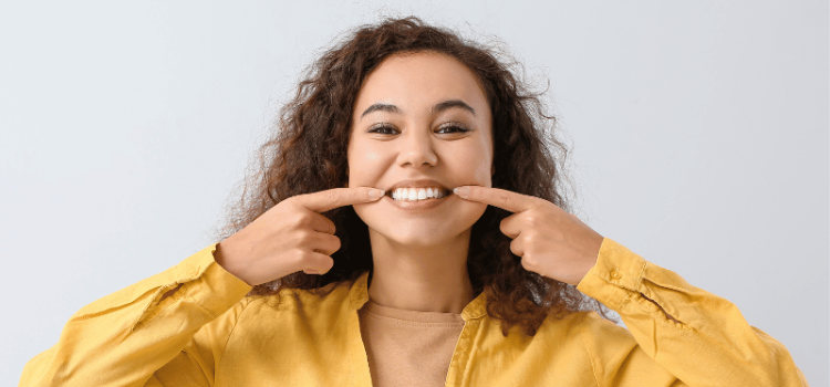 A woman smiling